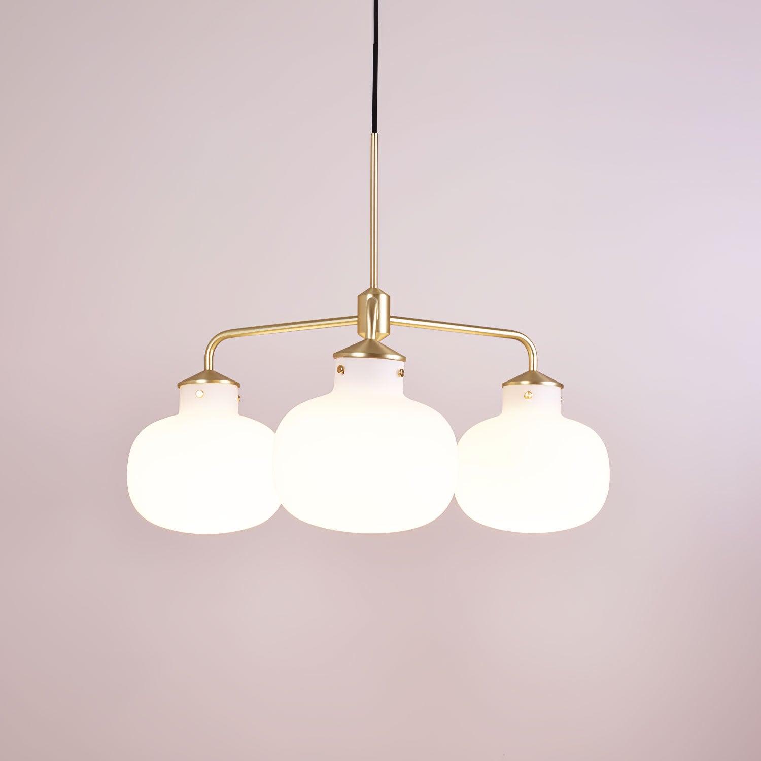 Modern Gold Metal and Opal Glass Globe Pendant Light for Contemporary Interiors