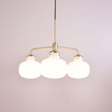 Modern Gold Metal and Opal Glass Globe Pendant Light for Contemporary Interiors