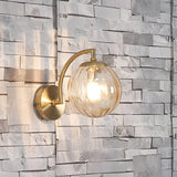 Modern Gold Wall Sconce with Ribbed Glass Globe Shade and Curved Arm Light Fixture