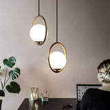 modern-hand-blown-glass-sphere-pendant-light-with-brushed-brass-metal-frame-for-elegant-interior-lighting