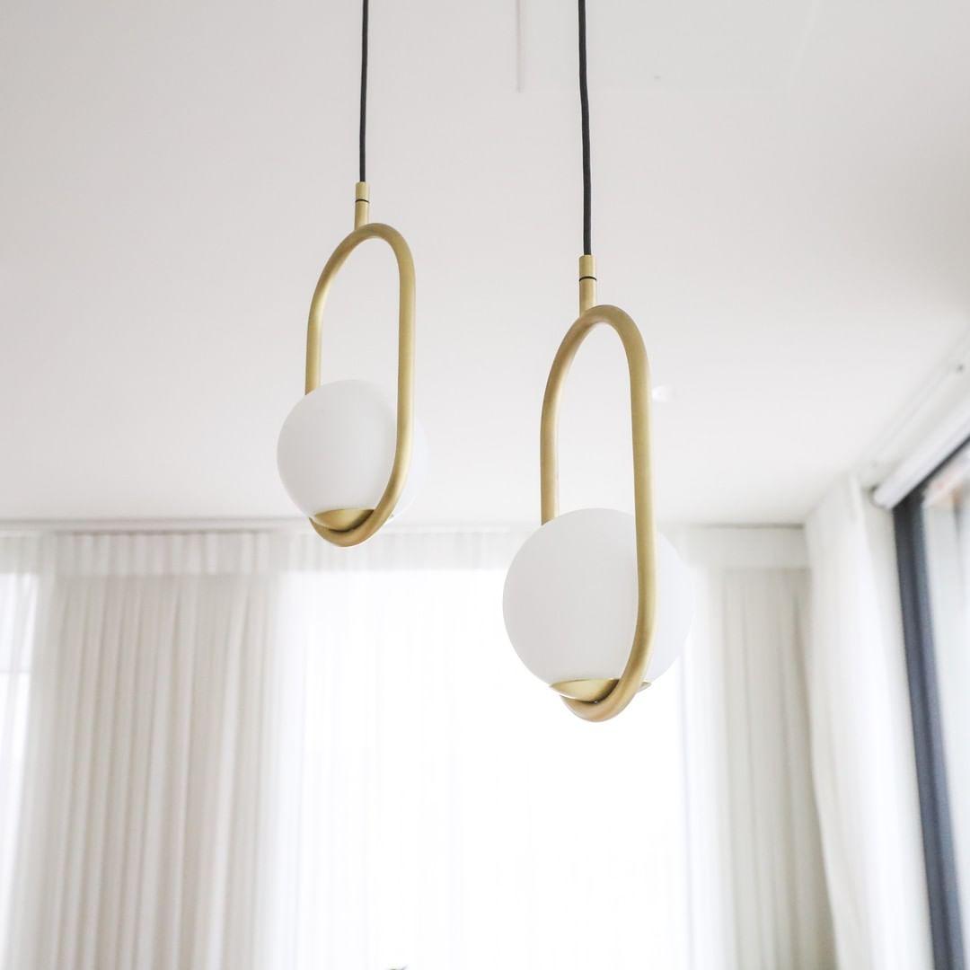 modern-hand-blown-glass-sphere-pendant-light-with-brushed-brass-metal-frame-for-elegant-interior-lighting
