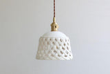 Modern Hand Carved White Ceramic Pendant Lamp with Adjustable Hanging Cord and Brass Finish