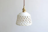 Modern Hand Carved White Ceramic Pendant Lamp with Adjustable Hanging Cord and Brass Finish