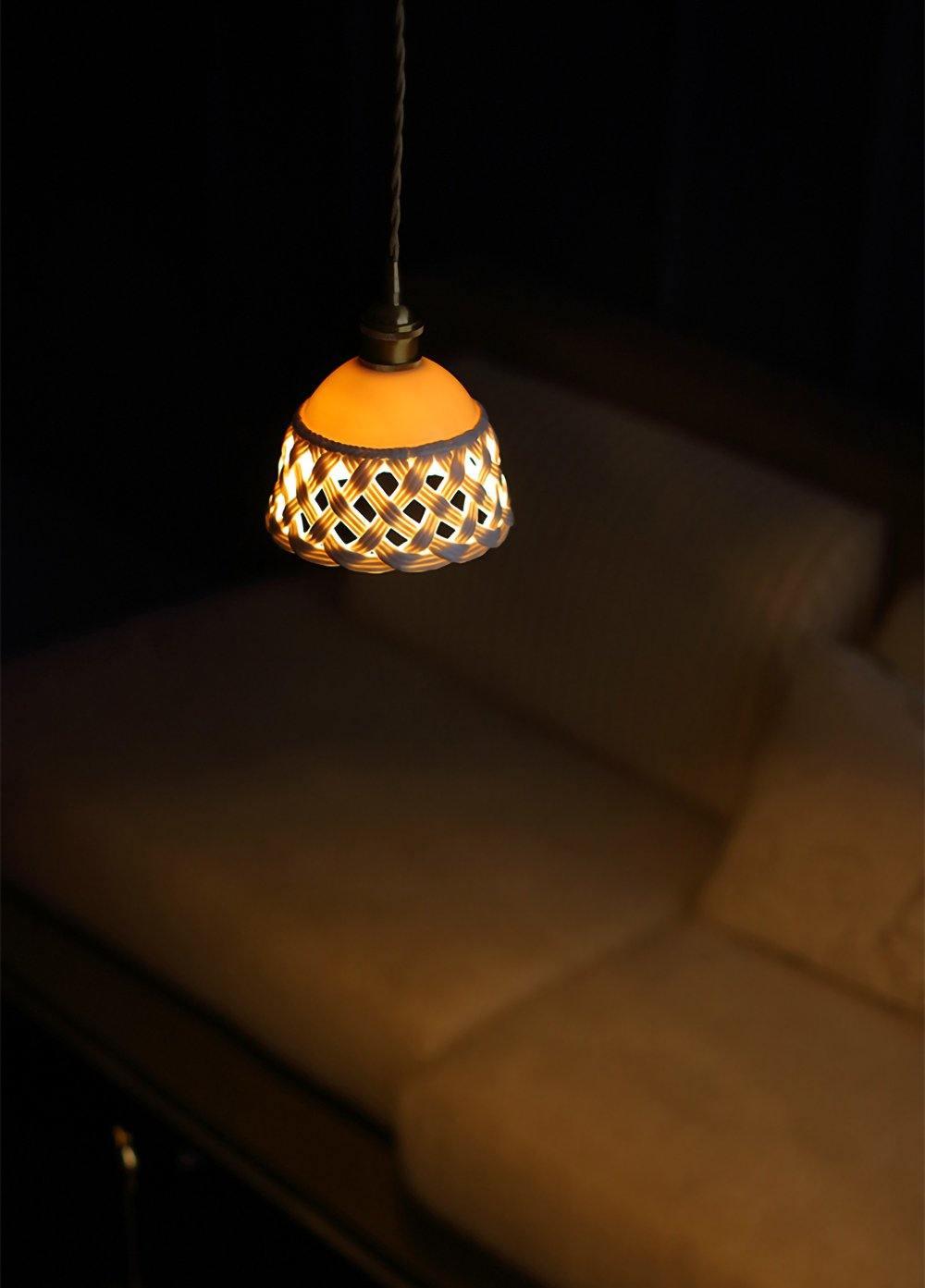 Modern Hand Carved White Ceramic Pendant Lamp with Adjustable Hanging Cord and Brass Finish