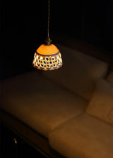 Modern Hand Carved White Ceramic Pendant Lamp with Adjustable Hanging Cord and Brass Finish