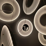 Modern Iris LED Pendant Light with White Fabric Shade and Adjustable Cable for Indoor Lighting