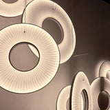 Modern Iris LED Pendant Light with White Fabric Shade and Adjustable Cable for Indoor Lighting