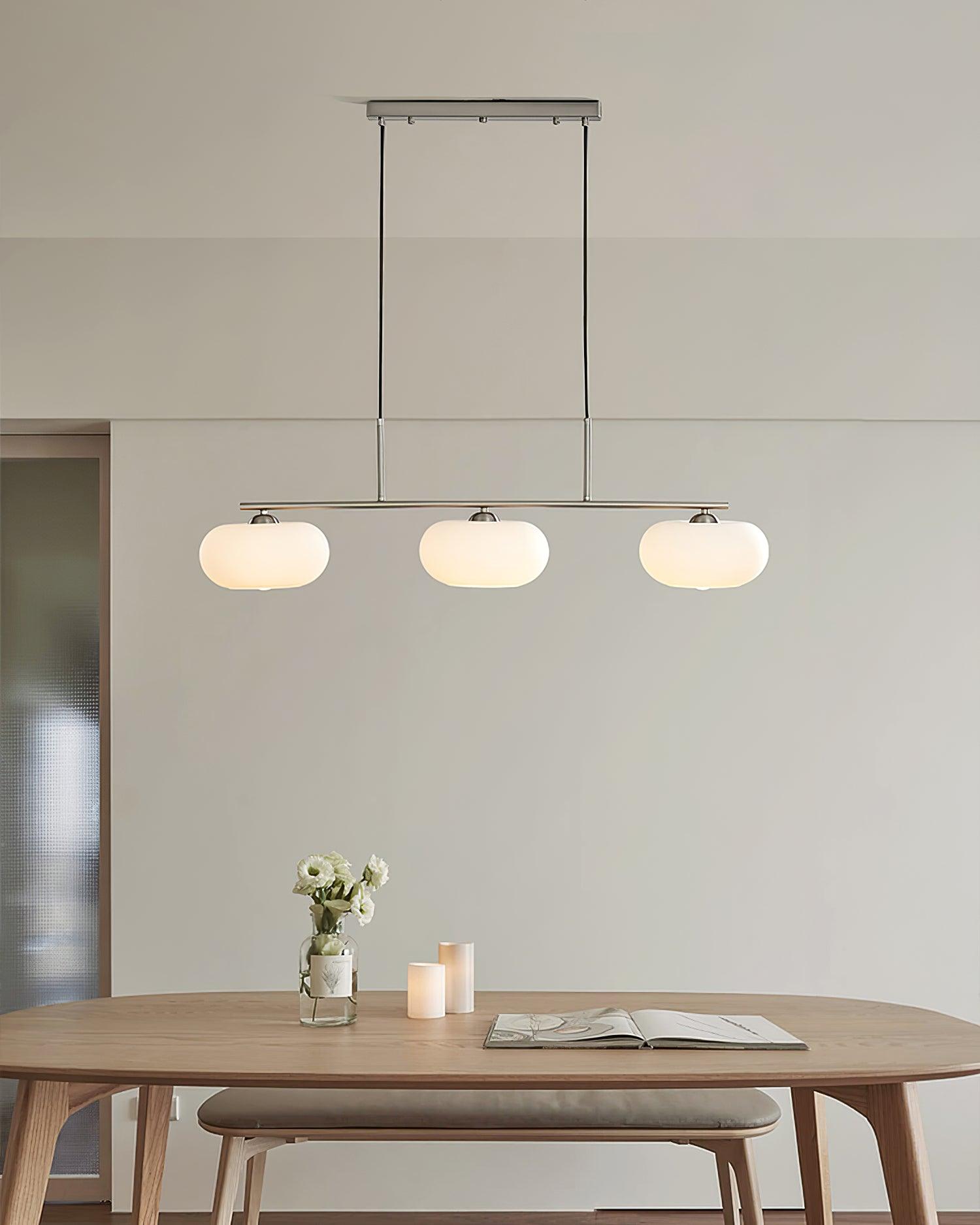 Modern Linear 3 Light Pendant with Globe Glass Shades and Adjustable Height