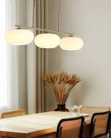 Modern Linear 3 Light Pendant with Globe Glass Shades and Adjustable Height
