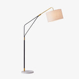 modern-marble-base-floor-lamp-with-oversized-white-linen-shade-and-iron-stand