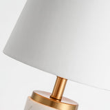 modern-marble-table-lamp-with-elegant-gold-accents-and-white-fabric-shade