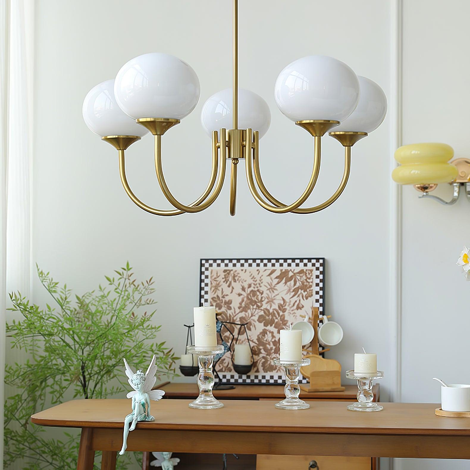 Modern Marshmallow Chandelier with Pink Glass Shades and Gold Finish Lighting