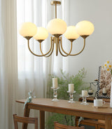 Modern Marshmallow Chandelier with Pink Glass Shades and Gold Finish Lighting
