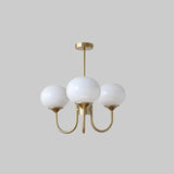 Modern Marshmallow Chandelier with Pink Glass Shades and Gold Finish Lighting