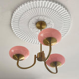 Modern Marshmallow Chandelier with Pink Glass Shades and Gold Finish Lighting