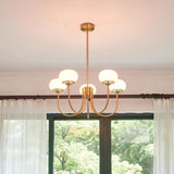 Modern Marshmallow Chandelier with Pink Glass Shades and Gold Finish Lighting