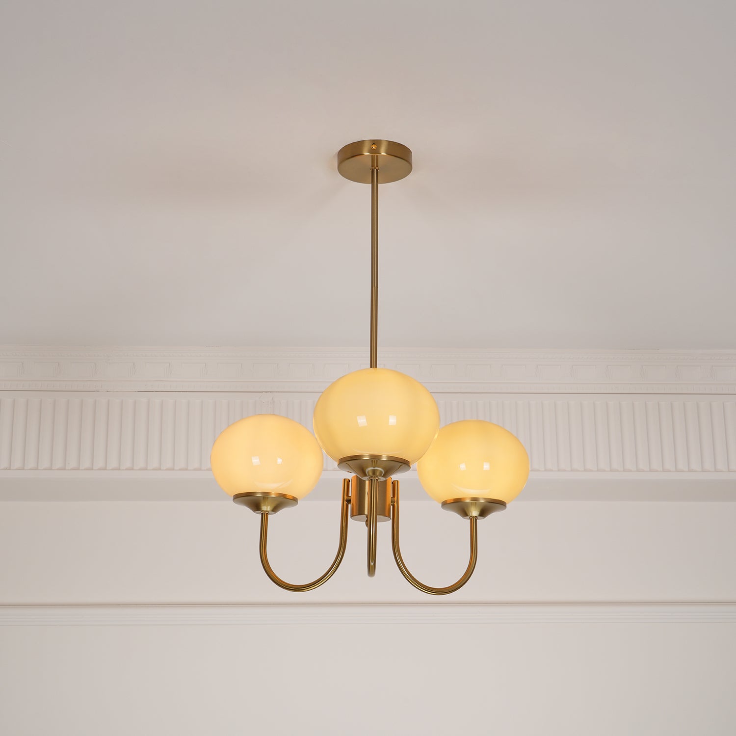 Modern Marshmallow Chandelier with Pink Glass Shades and Gold Finish Lighting