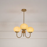 Modern Marshmallow Chandelier with Pink Glass Shades and Gold Finish Lighting