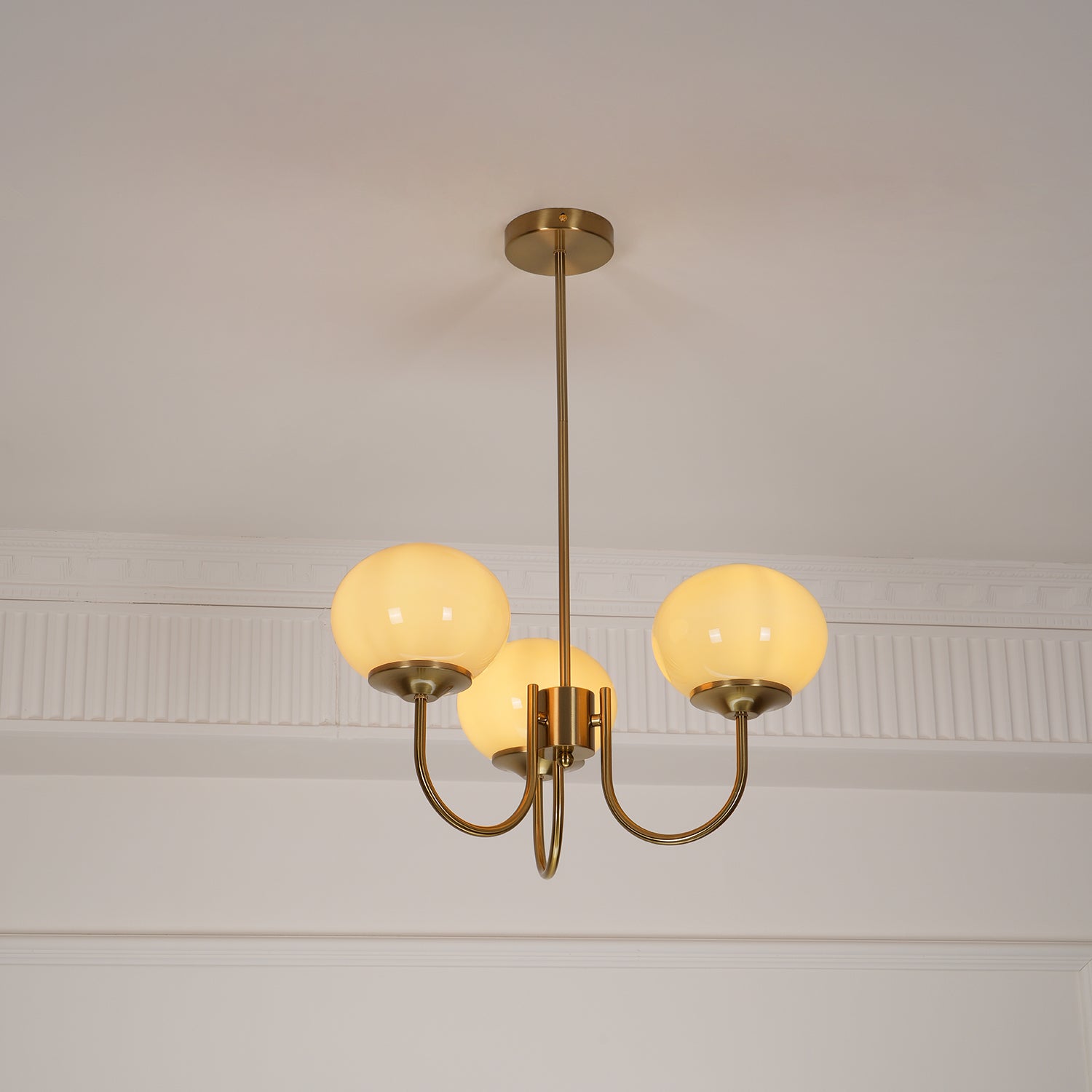 Modern Marshmallow Chandelier with Pink Glass Shades and Gold Finish Lighting