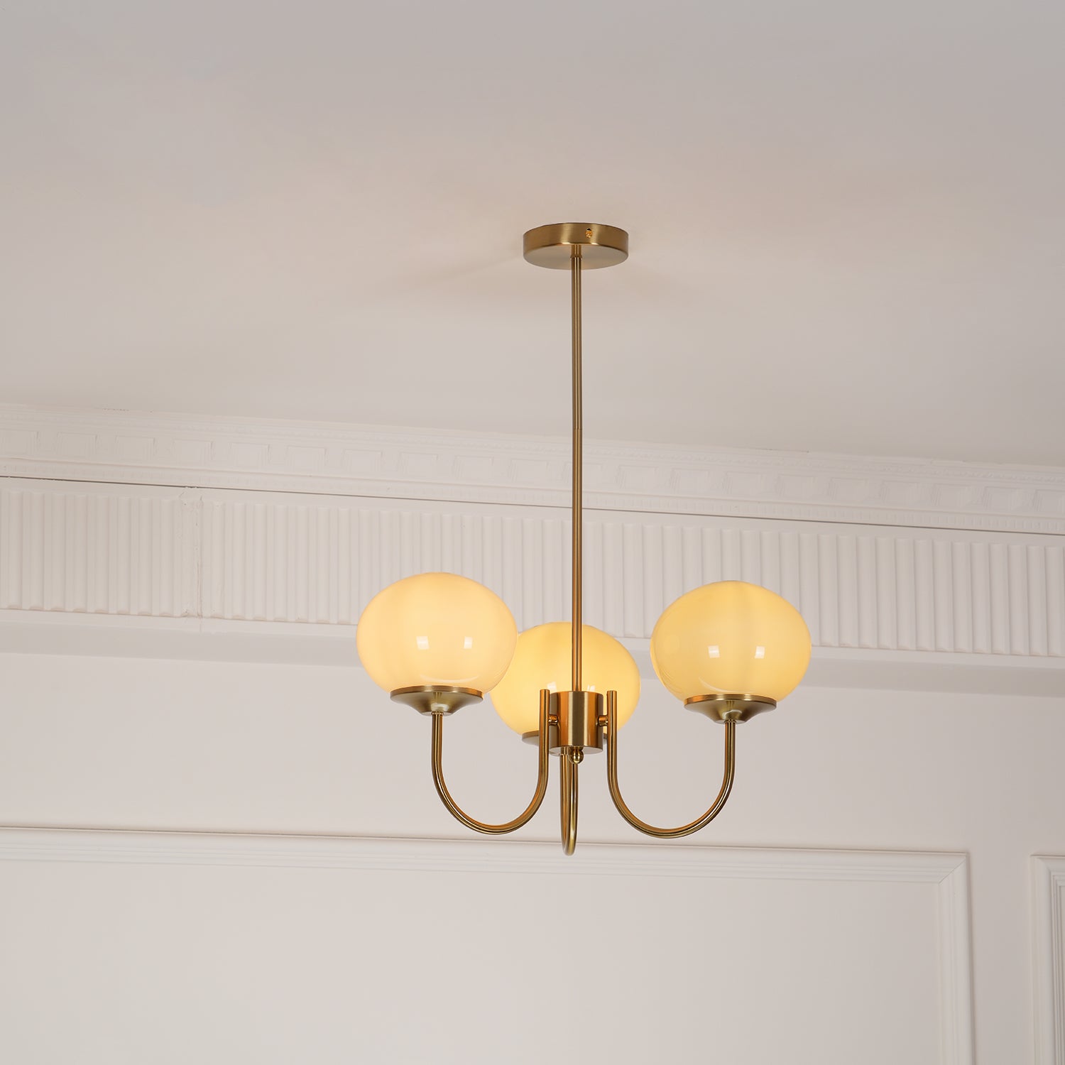 Modern Marshmallow Chandelier with Pink Glass Shades and Gold Finish Lighting