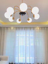 modern-mid-century-glass-globe-chandelier-with-metal-rod-frame-and-white-opal-shades