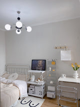 modern-mid-century-glass-globe-chandelier-with-metal-rod-frame-and-white-opal-shades