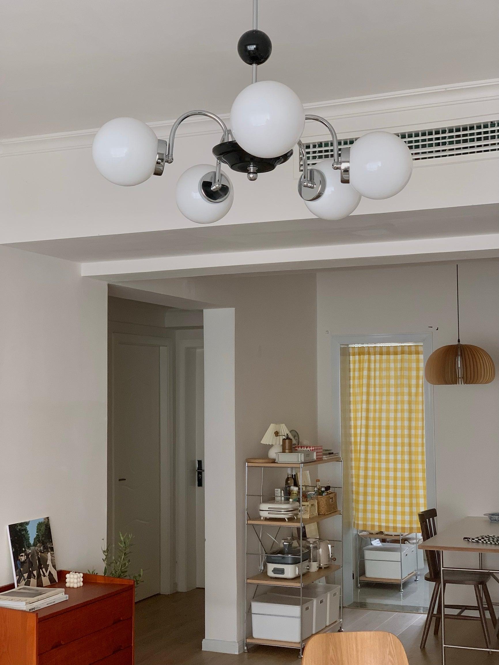 modern-mid-century-glass-globe-chandelier-with-metal-rod-frame-and-white-opal-shades