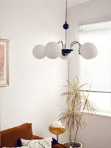 modern-mid-century-glass-globe-chandelier-with-metal-rod-frame-and-white-opal-shades