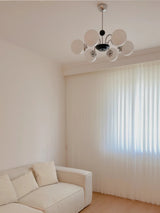 modern-mid-century-glass-globe-chandelier-with-metal-rod-frame-and-white-opal-shades