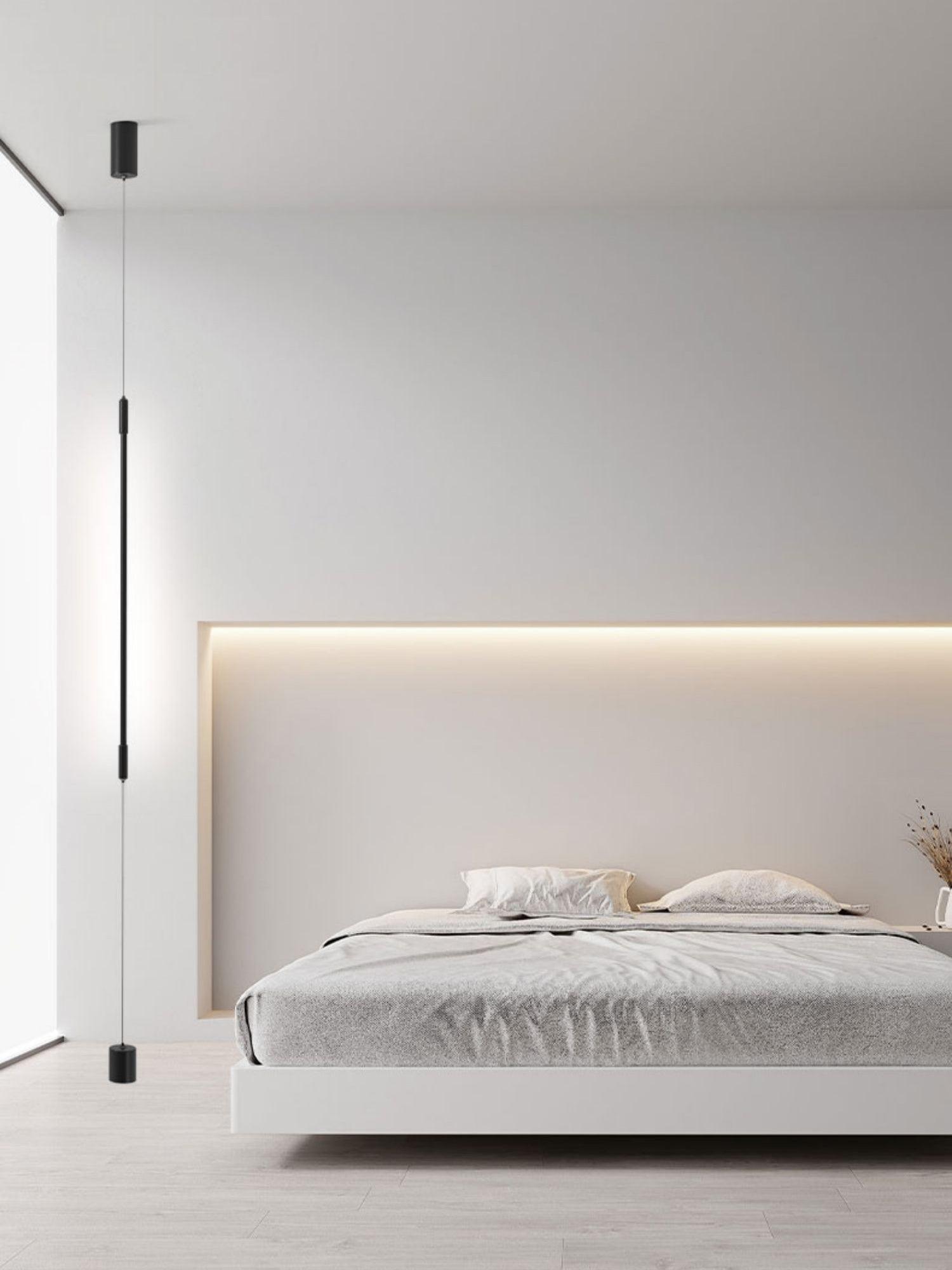 Modern Minimalist Black Slim Vertical LED Pendant Lamp for Contemporary Interiors