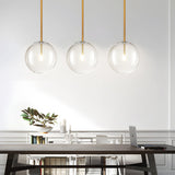 Modern Minimalist Clear Glass Globe Pendant Light with Iron Hardware for Dining Room