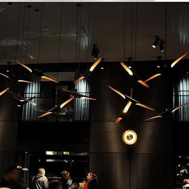 Modern Minimalist Cylindrical Pipe Pendant Light in Matte Black and Gold Finish