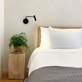 Modern Minimalist Disc LED Wall Sconce Set with Adjustable Pivoting Arm for Bedside Reading