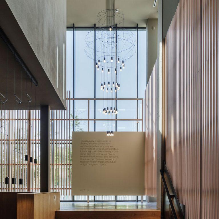Modern Minimalist Linear LED Chandelier with Multi Head Design
