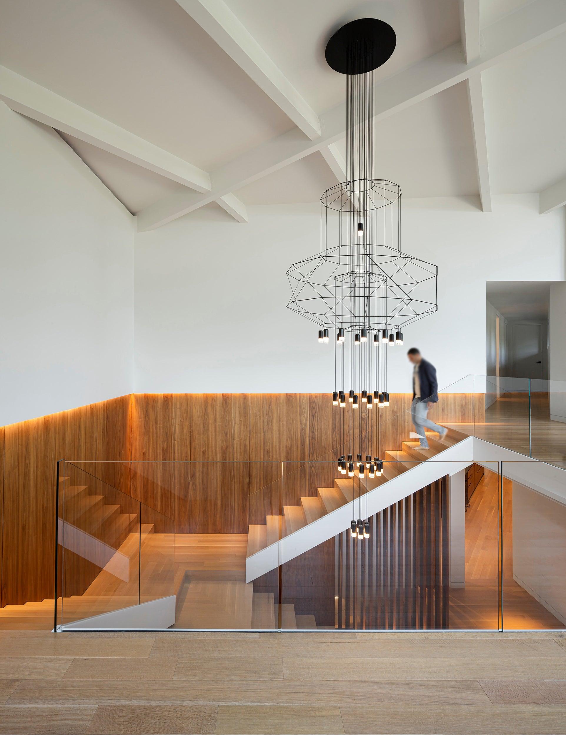 Modern Minimalist Linear LED Chandelier with Multi Head Design