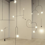 Modern Minimalist Linear Mobile Chandelier with Opal Glass Globes and Black Finish