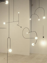Modern Minimalist Linear Mobile Chandelier with Opal Glass Globes and Black Finish