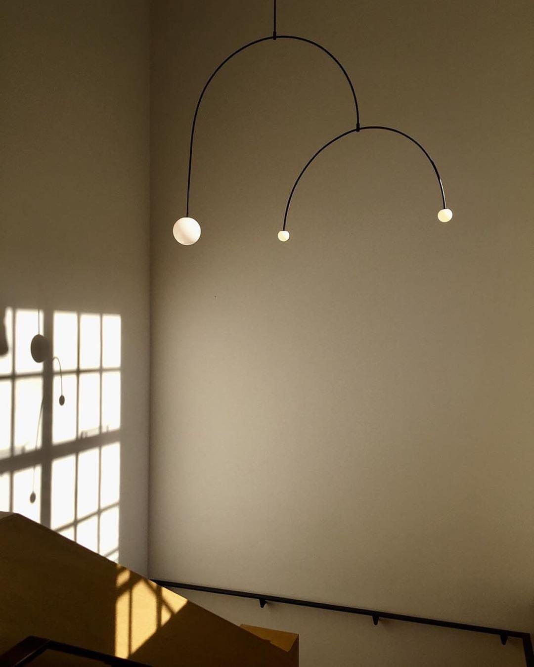 Modern Minimalist Linear Mobile Chandelier with Opal Glass Globes and Black Finish