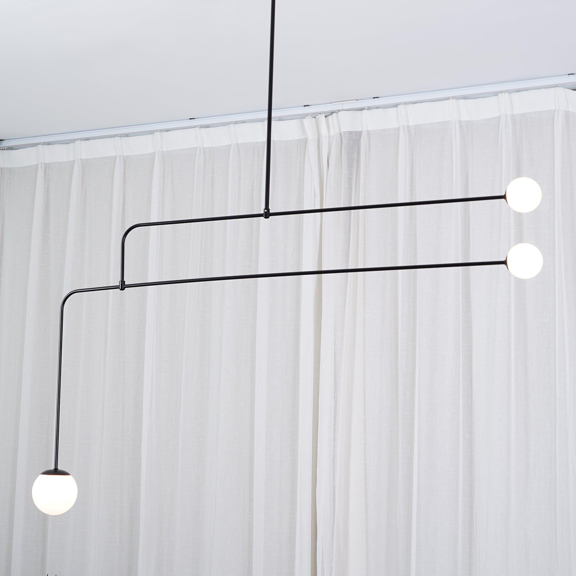 Modern Minimalist Linear Mobile Chandelier with Opal Glass Globes and Black Finish
