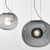 modern-pearl-sphere-pendant-lamp-with-matte-inner-core-and-clear-glass-shade