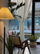modern-pleated-floor-lamp-with-solid-wood-base-and-white-fabric-shade-for-living-room