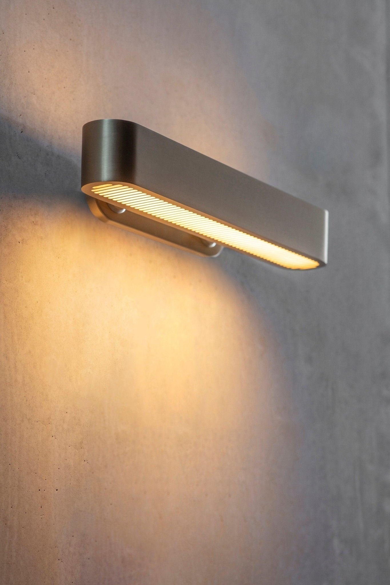 Modern Polished Brass Slotted Grill Wall Sconce with Opal Diffuser and Integrated LED