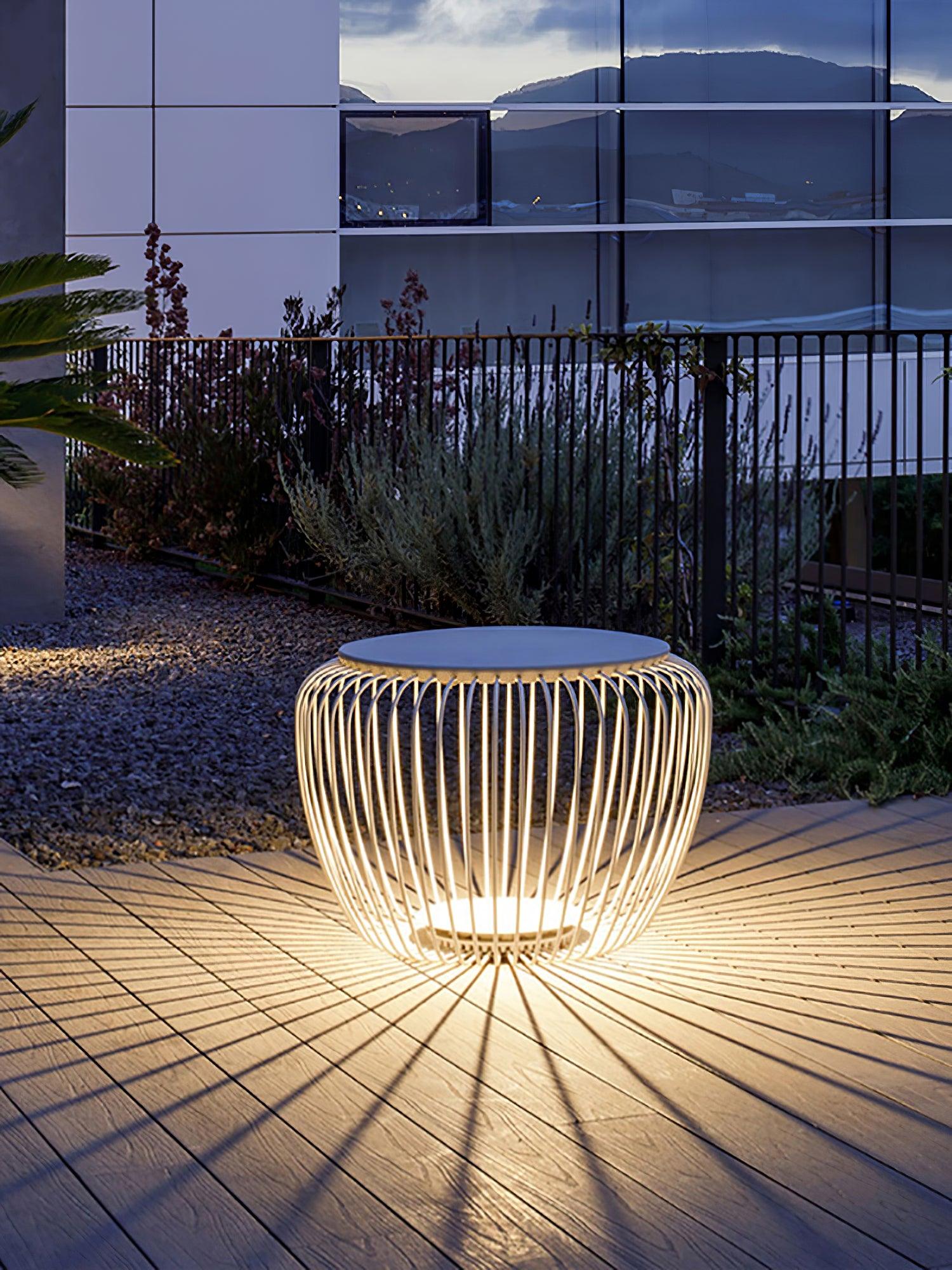 modern-round-steel-outdoor-garden-table-light-with-integrated-solar-powered-led-lighting