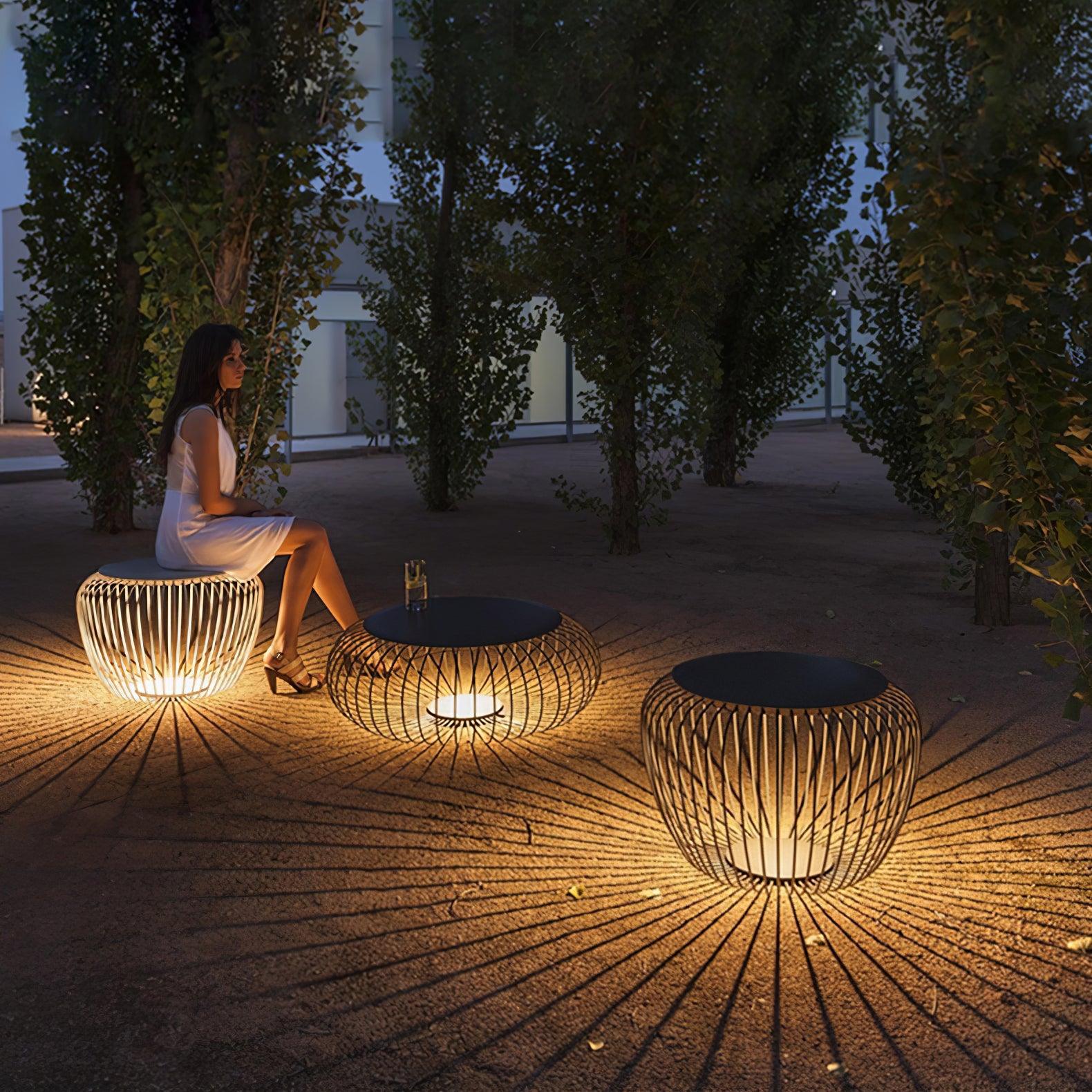 modern-round-steel-outdoor-garden-table-light-with-integrated-solar-powered-led-lighting