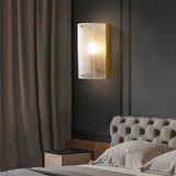 Modern Rounded Opaque Glass Wall Sconce with Antique Brass Finish Interior Lighting