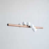 Modern Scandinavian Wood Linear Pendant Light with Glass Globe Shades