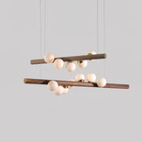 Modern Scandinavian Wood Linear Pendant Light with Glass Globe Shades