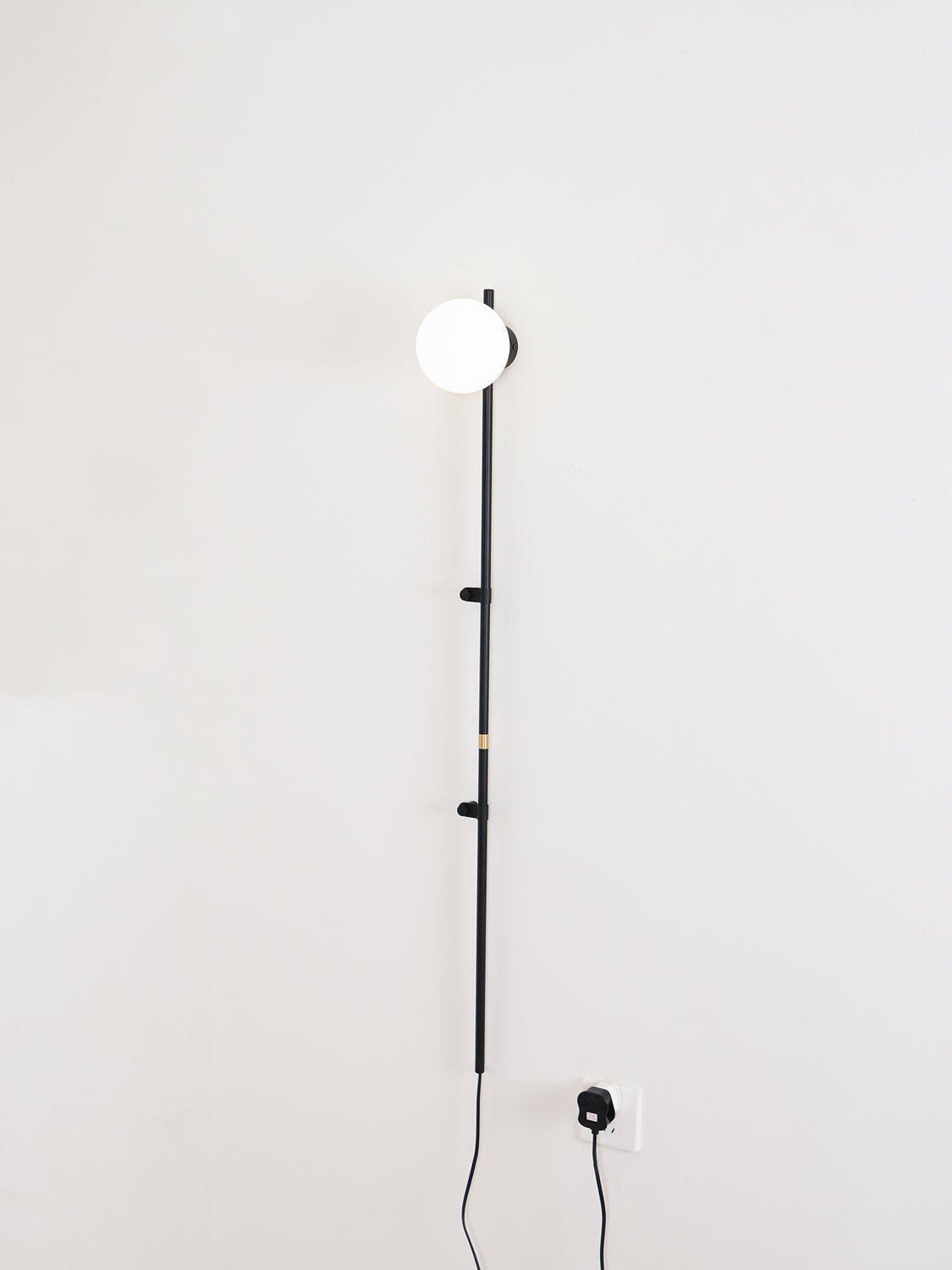 Modern Tall Vertical Stem Wall Lamp with White Glass Globe and Plug In Cord