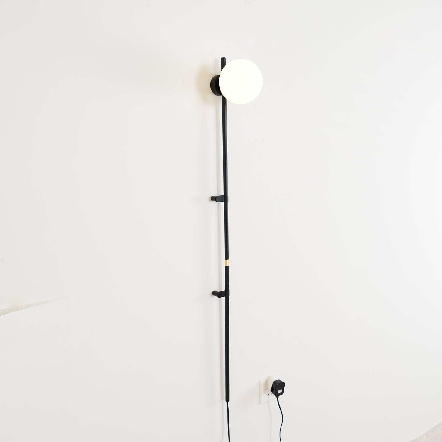 Modern Tall Vertical Stem Wall Lamp with White Glass Globe and Plug In Cord