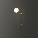 Modern Vertical Brass Wall Sconce with Globe Glass Shade Plug In Lighting Fixture